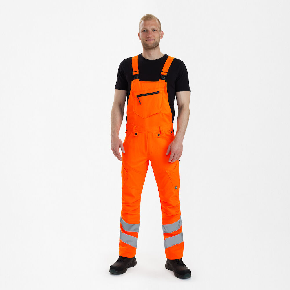 SAFETY Latzhose mit 2-Wege-Stretch – Warnorange (Am Modell)